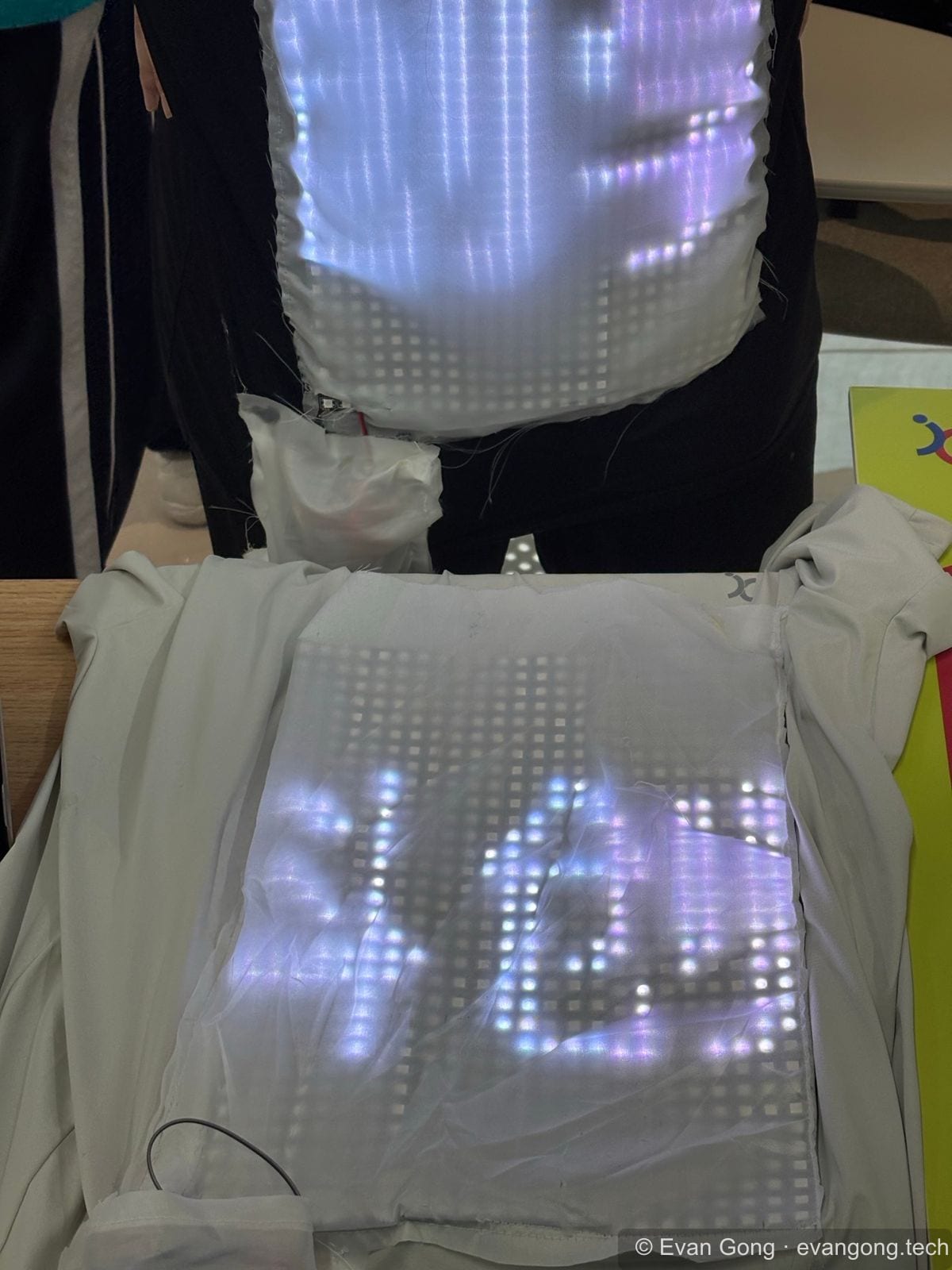 Two LightLink wearable display prototypes showing illuminated LED patterns